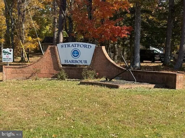 a view of swimming pool with a yard