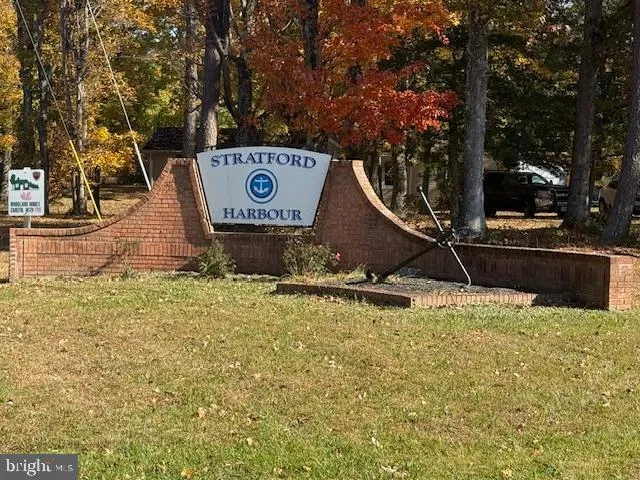 a view of swimming pool with a yard