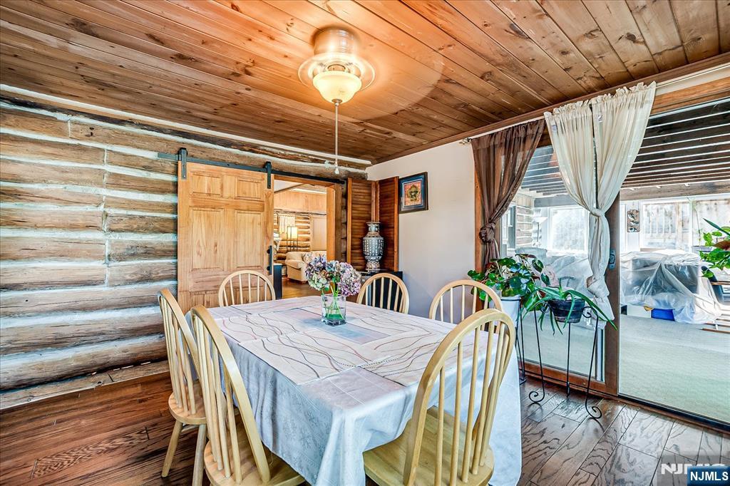 177 Otterhole Road West Milford, NJ 07480 - Photo 18 of 49 a view of a dining room with furniture window and wooden floor
