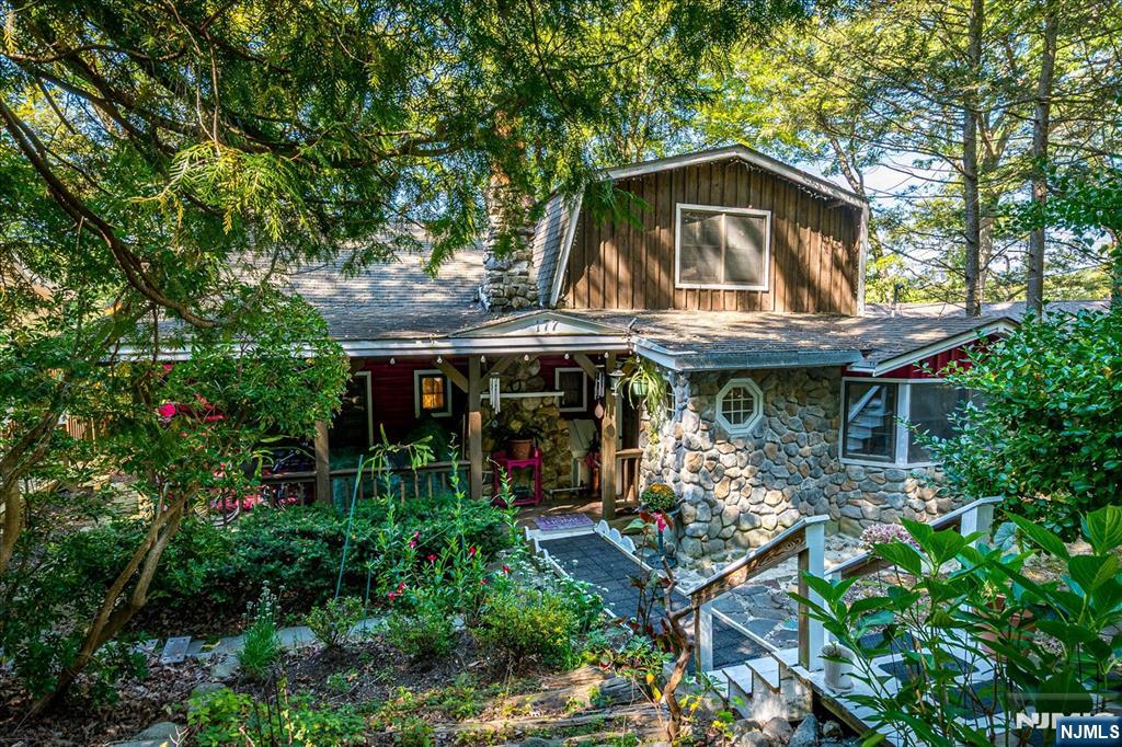 177 Otterhole Road West Milford, NJ 07480 - Photo 2 of 49 a view of a small house with roof deck front of house