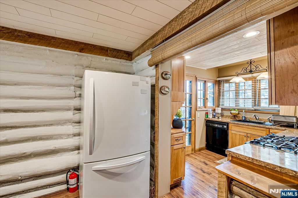 177 Otterhole Road West Milford, NJ 07480 - Photo 22 of 49 a kitchen with a refrigerator and a stove