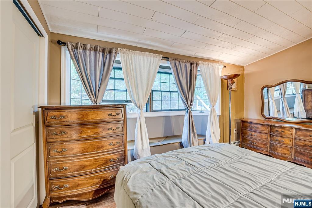177 Otterhole Road West Milford, NJ 07480 - Photo 28 of 49 a bedroom with a bed and a dresser