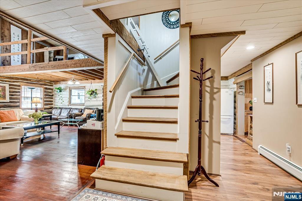 177 Otterhole Road West Milford, NJ 07480 - Photo 31 of 49 a view of entryway and hall with wooden floor