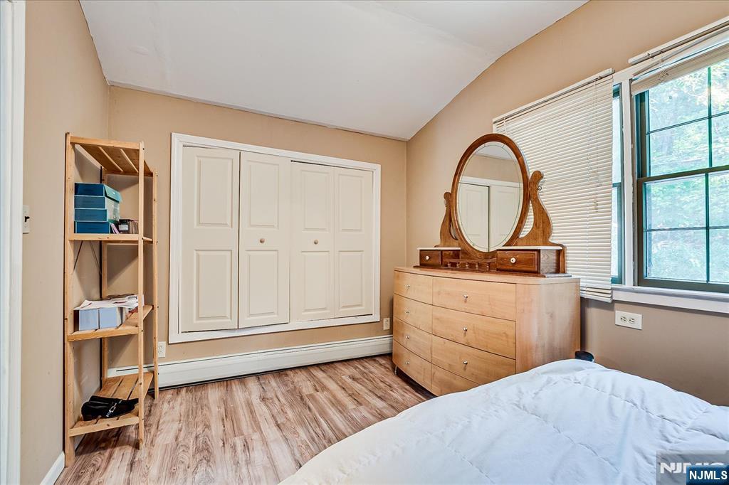 177 Otterhole Road West Milford, NJ 07480 - Photo 36 of 49 a bedroom with a bed and a dresser