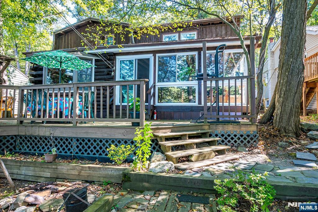 177 Otterhole Road West Milford, NJ 07480 - Photo 48 of 49 a house with lake view