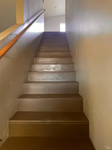 a view of a lake with a yard