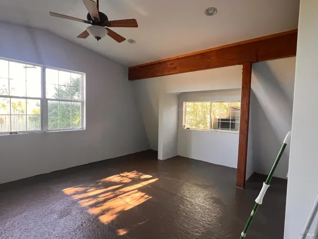 a backyard of a house with lots of green space