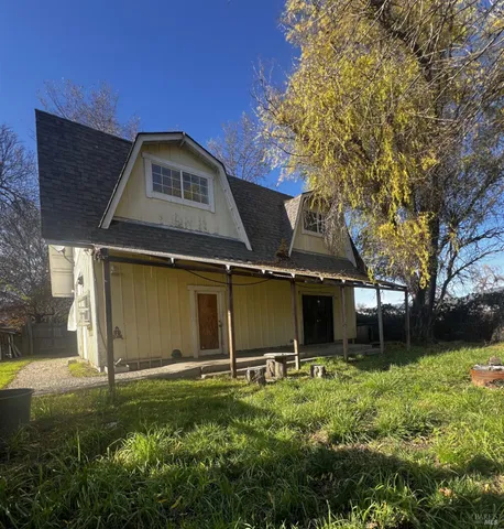 a kitchen with stainless steel appliances granite countertop a sink and a stove