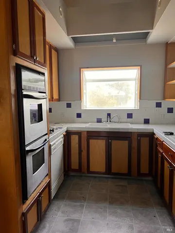 a bathroom with a toilet and a bathtub