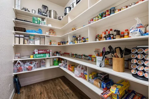 a kitchen with a stove and cabinets