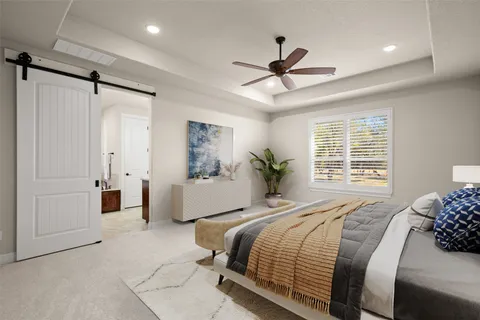a room with storage and a white refrigerator