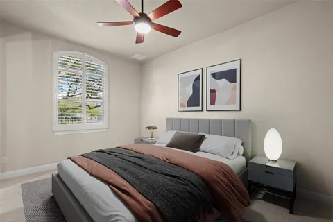 a view of a workspace with furniture and wooden floor