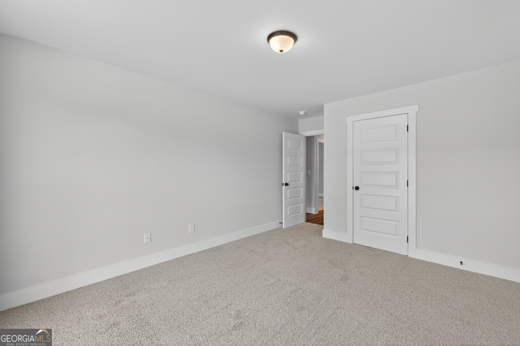 373 Liberty Hill Road, Unit 19 Hartwell, GA 30643 - Photo 17 of 31 a view of an empty room