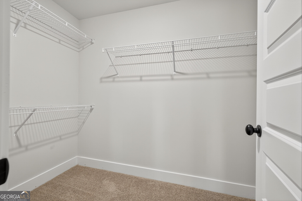 373 Liberty Hill Road, Unit 19 Hartwell, GA 30643 - Photo 26 of 31 a view of a room with racks on the wall