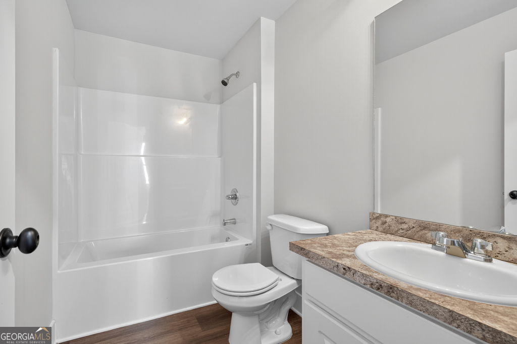 373 Liberty Hill Road, Unit 19 Hartwell, GA 30643 - Photo 28 of 31 a bathroom with a sink toilet and shower