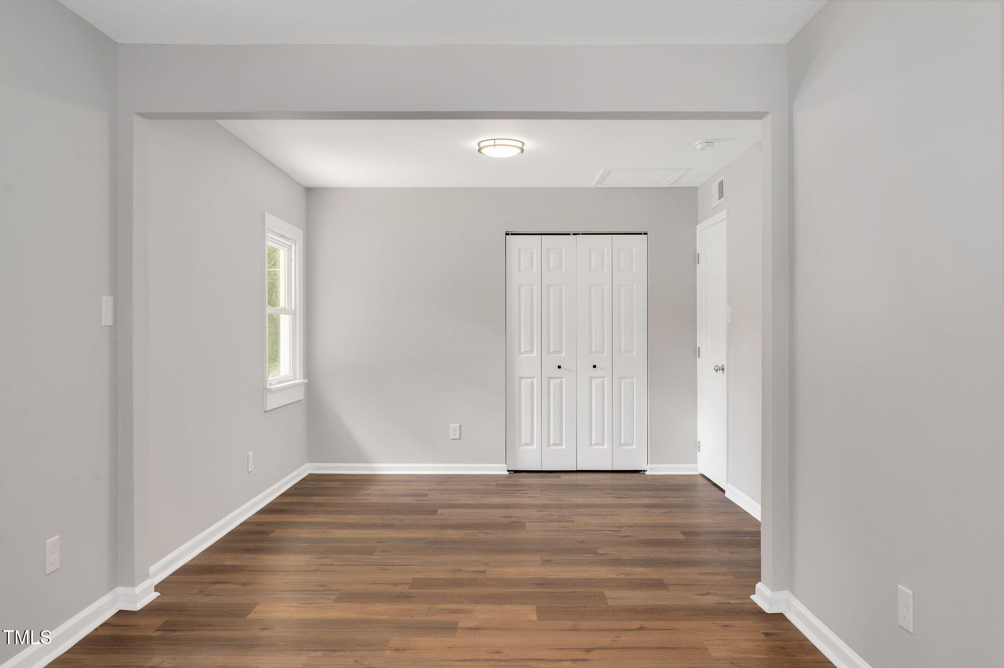 529 Solar Drive Raleigh, NC 27610 - Photo 15 of 18 a view of a room with wooden floor