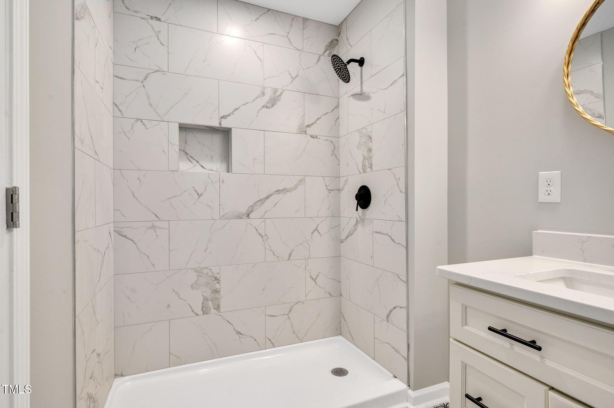 529 Solar Drive Raleigh, NC 27610 - Photo 18 of 18 a bathroom with a shower and vanity