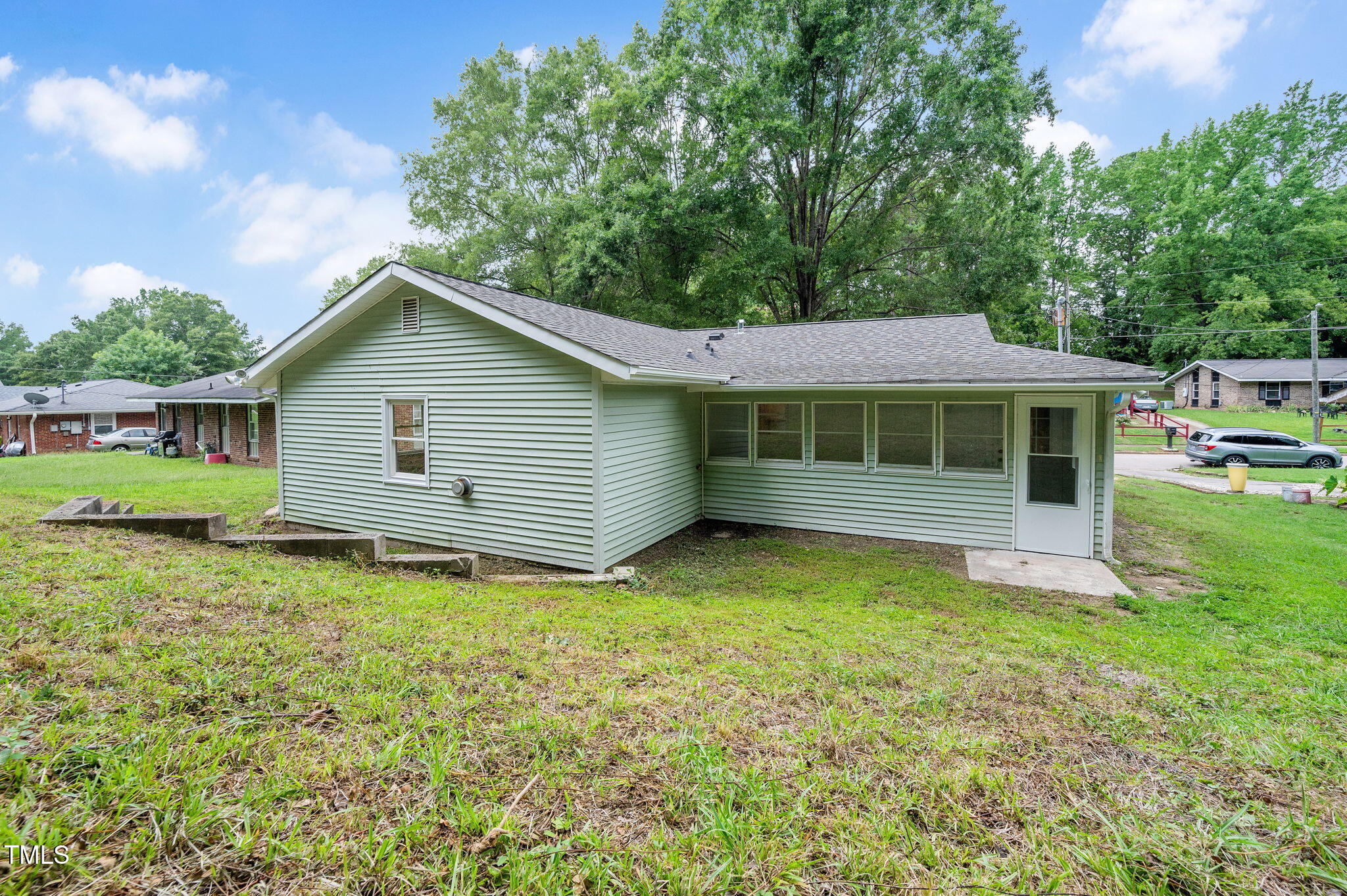 529 Solar Drive Raleigh, NC 27610 - Photo 3 of 18 a backyard of a house with table and chairs