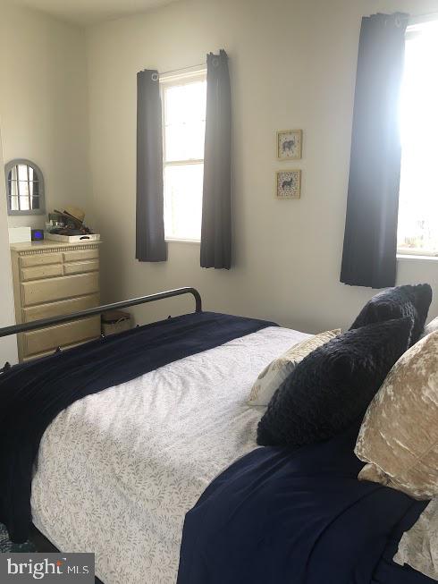 753 South 22nd Street Philadelphia, PA 19146 - Photo 16 of 22 a bedroom with a bed and a window