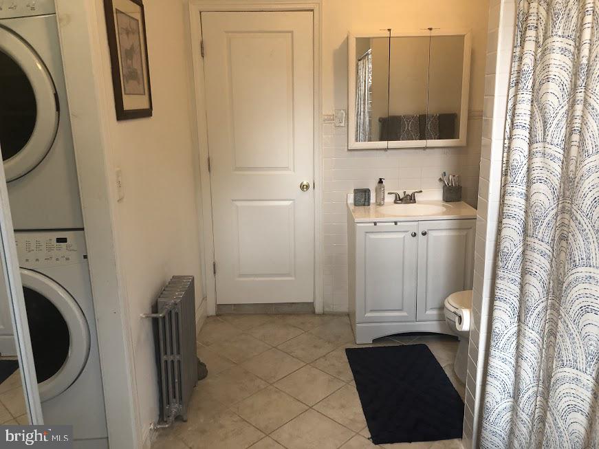 753 South 22nd Street Philadelphia, PA 19146 - Photo 19 of 22 a bathroom with a sink a toilet and a mirror