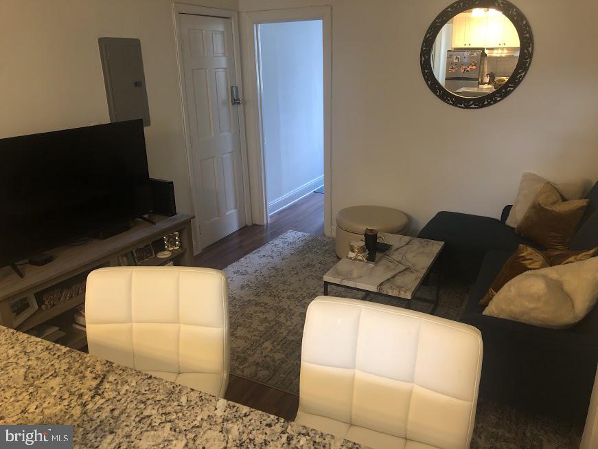 753 South 22nd Street Philadelphia, PA 19146 - Photo 20 of 22 a bed room with furniture and a flat screen tv