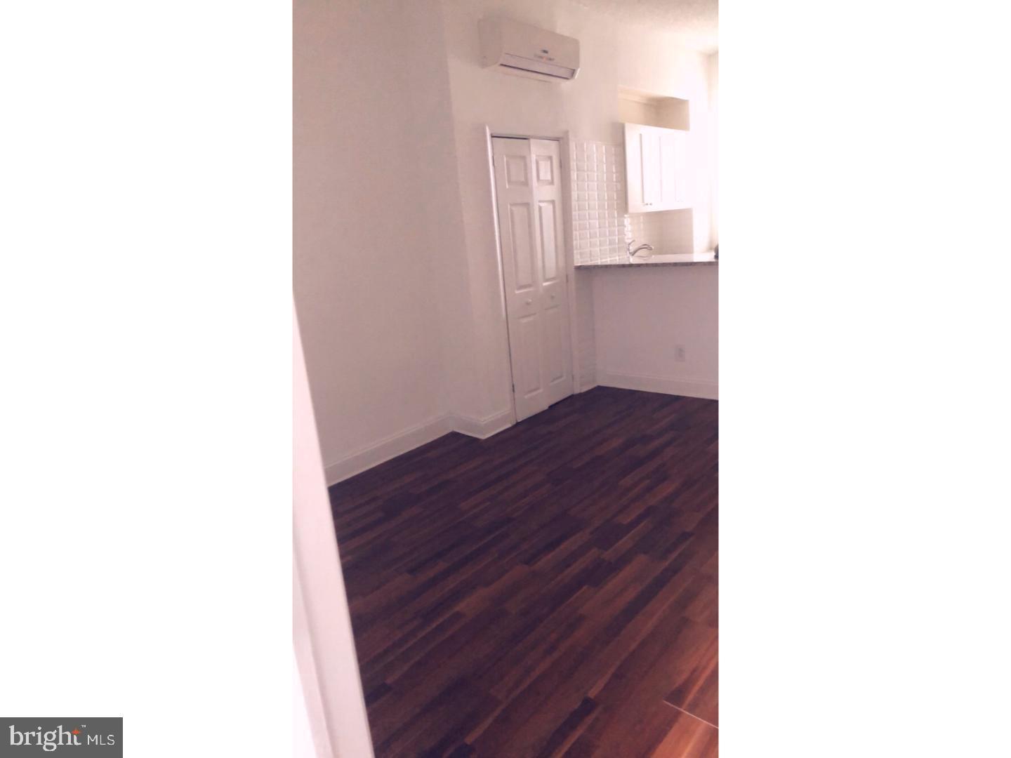 753 South 22nd Street Philadelphia, PA 19146 - Photo 6 of 22 a view of a room with wooden floor