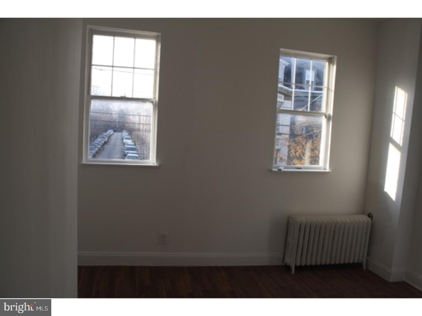 753 South 22nd Street Philadelphia, PA 19146 - Photo 7 of 22 a view of an empty room with a window