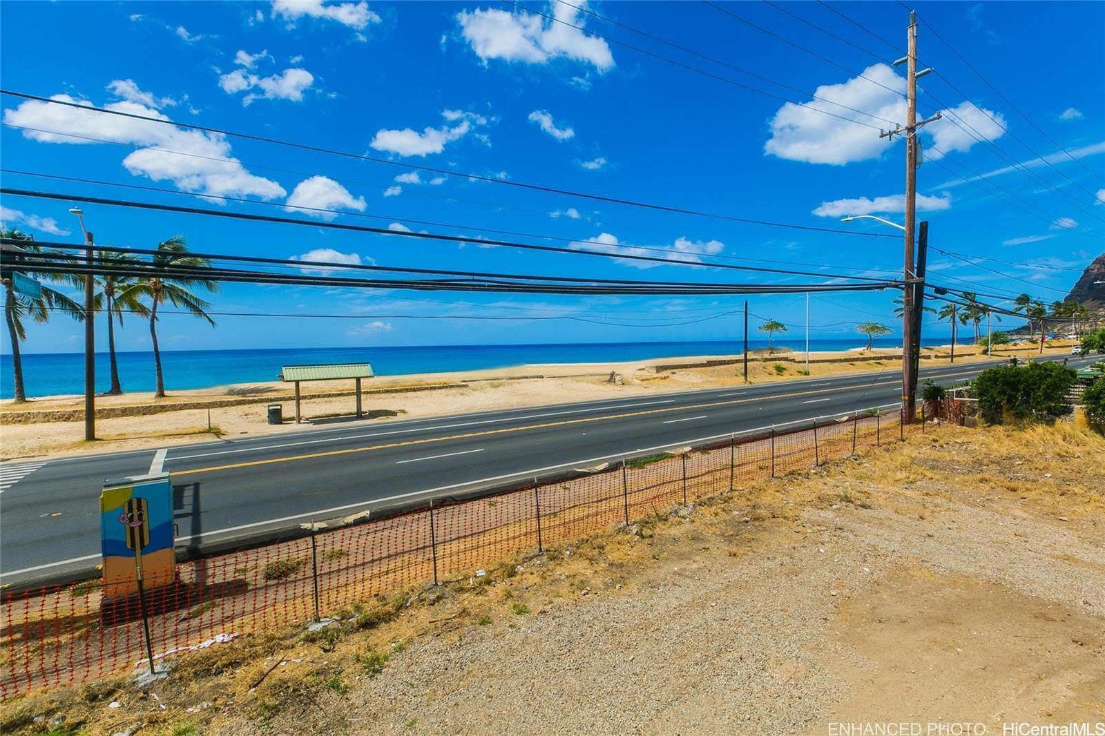 87-1910 Farrington Highway, Unit 2 Waianae, HI 96792 - Photo 1 of 8 a view of a swimming pool and an outdoor space