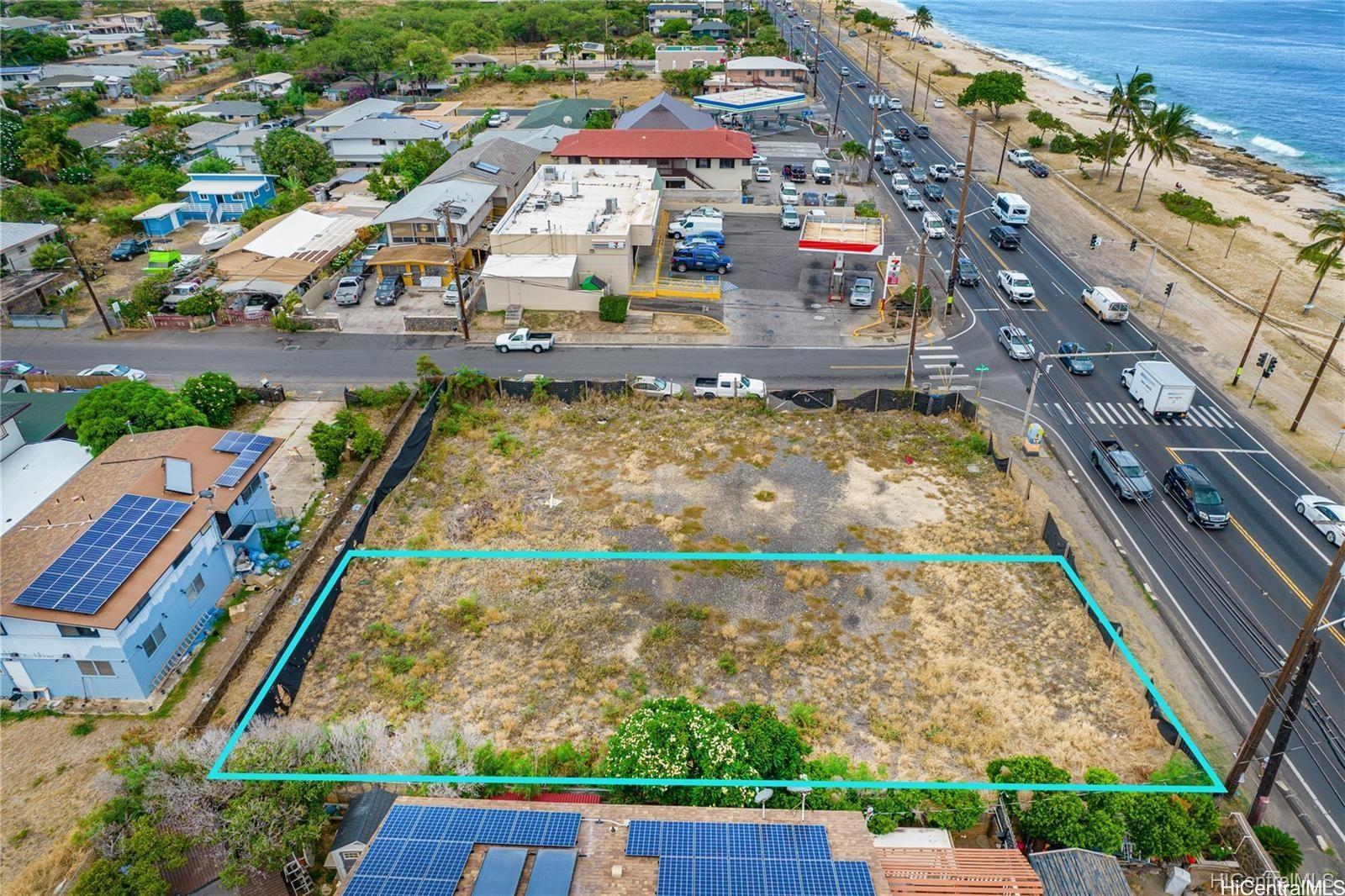 87-1910 Farrington Highway, Unit 2 Waianae, HI 96792 - Photo 2 of 8 an aerial view of residential houses with outdoor space