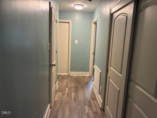 3102 Summit Road Goldsboro, NC 27534 - Photo 16 of 30 a view of a hallway with wooden floor