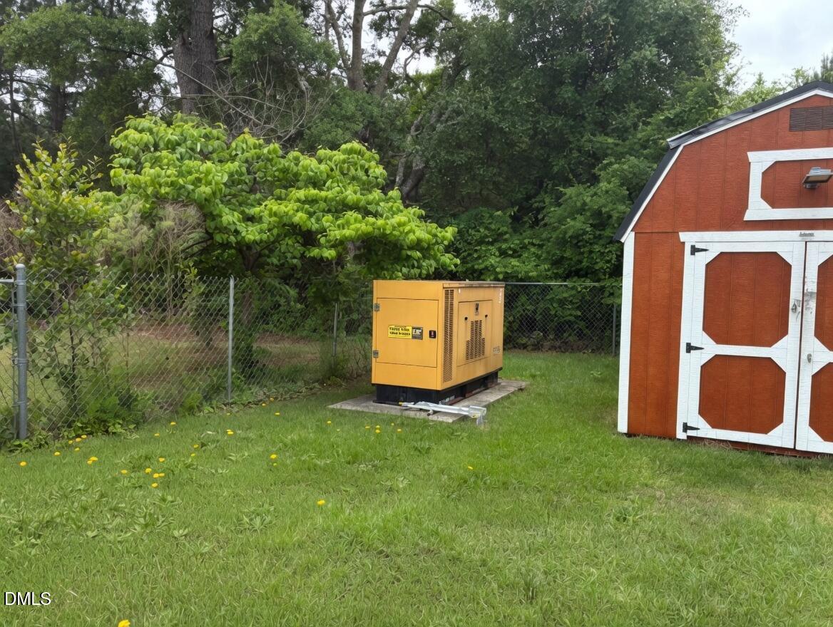 3102 Summit Road Goldsboro, NC 27534 - Photo 21 of 30 a backyard of a house with lots of green space
