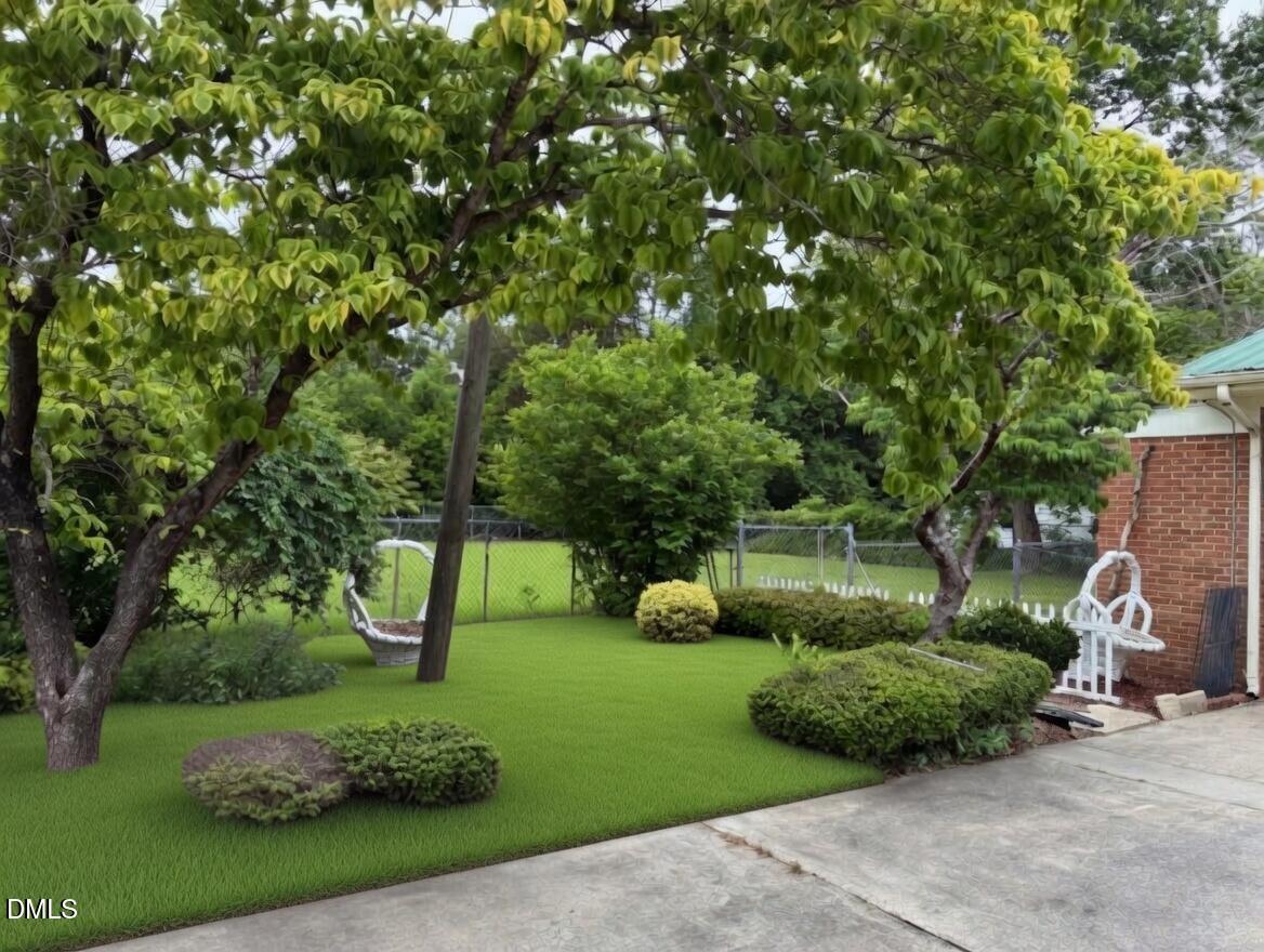 3102 Summit Road Goldsboro, NC 27534 - Photo 23 of 30 a view of a garden with plants
