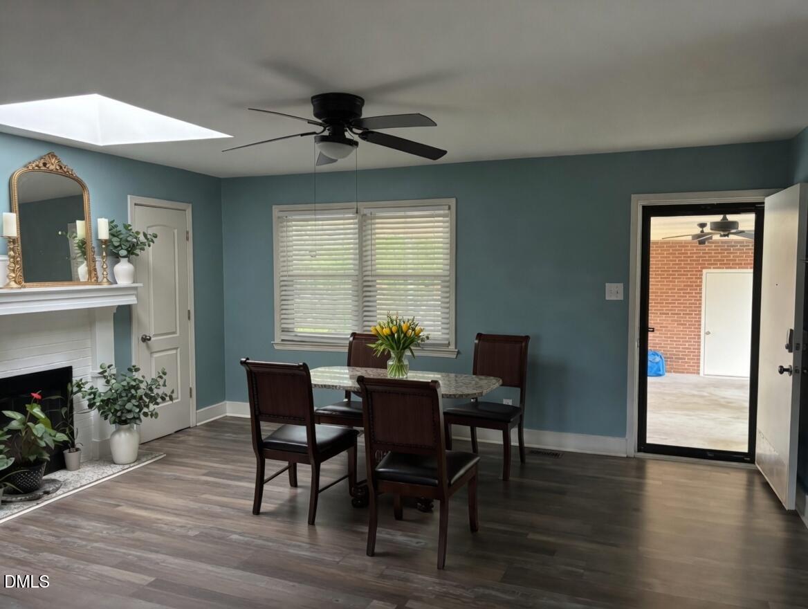 3102 Summit Road Goldsboro, NC 27534 - Photo 9 of 30 a view of a dining room with furniture window and wooden floor