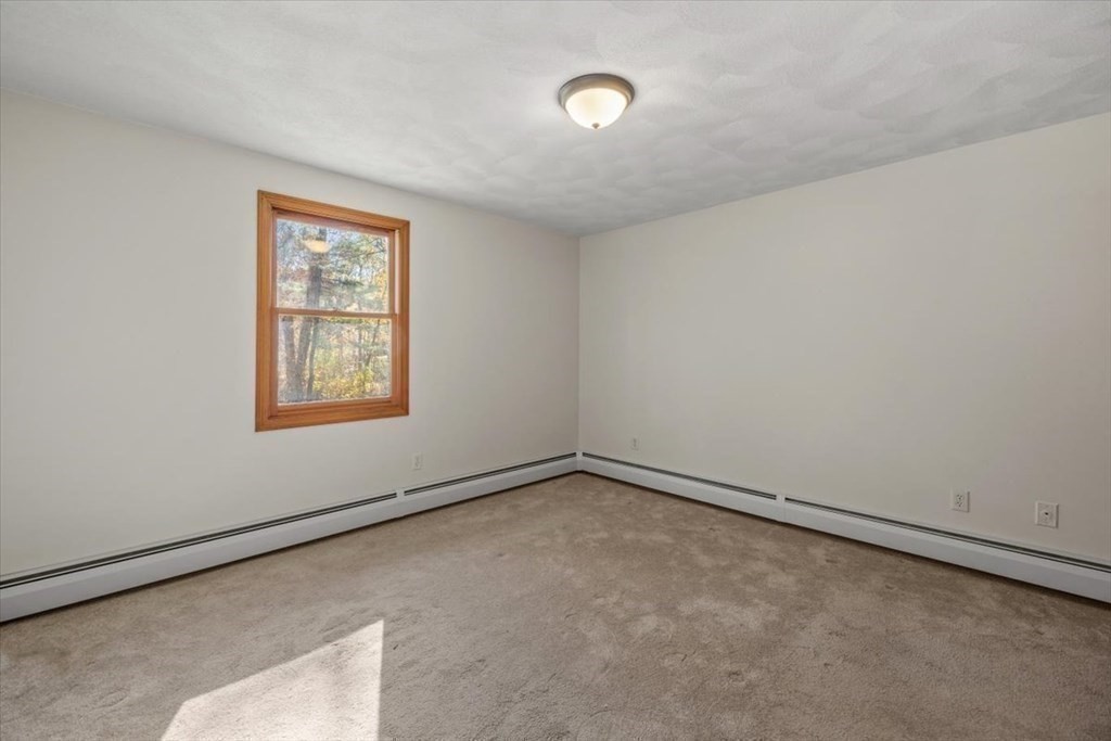 107 Ash Street Rehoboth, MA 02769 - Photo 13 of 34 an empty room with a window