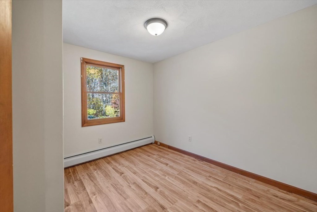107 Ash Street Rehoboth, MA 02769 - Photo 14 of 34 an empty room with a window