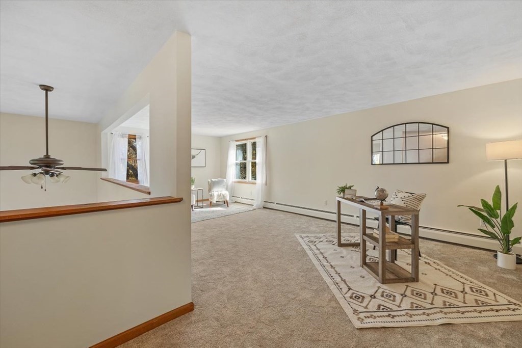 107 Ash Street Rehoboth, MA 02769 - Photo 17 of 34 a view of a living room and chandelier