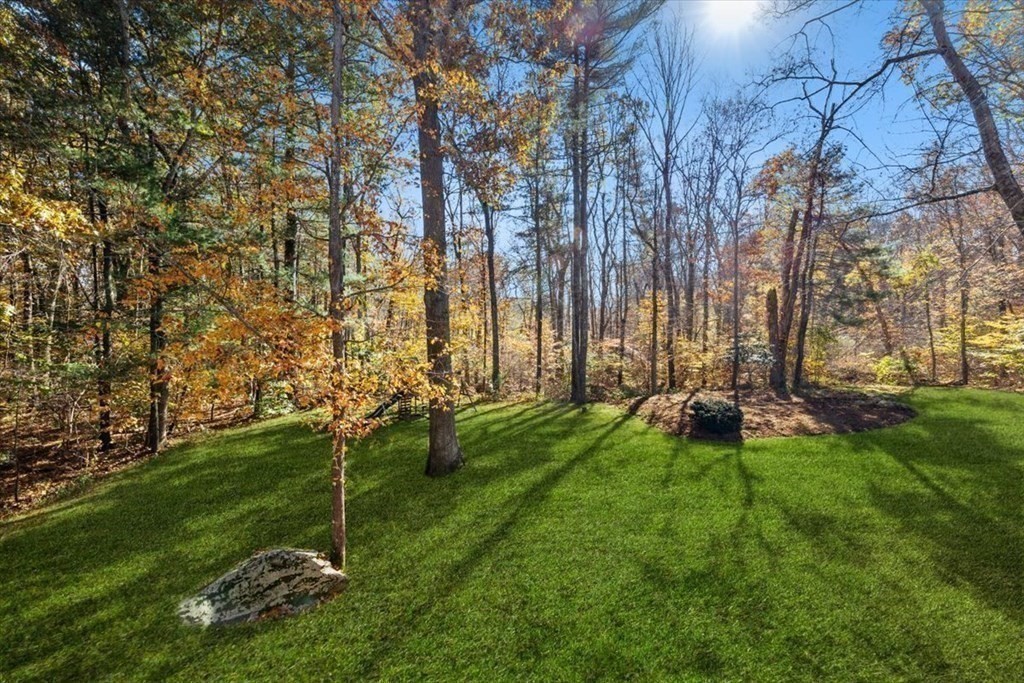 107 Ash Street Rehoboth, MA 02769 - Photo 27 of 34 a backyard of a house with table and chairs