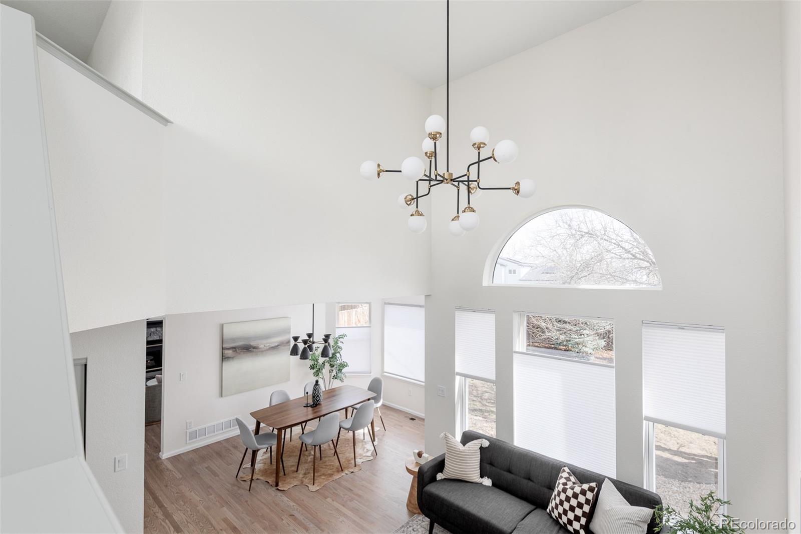 10754 West 107th Circle Westminster, CO 80021 - Photo 15 of 24 a view of a livingroom with furniture and window