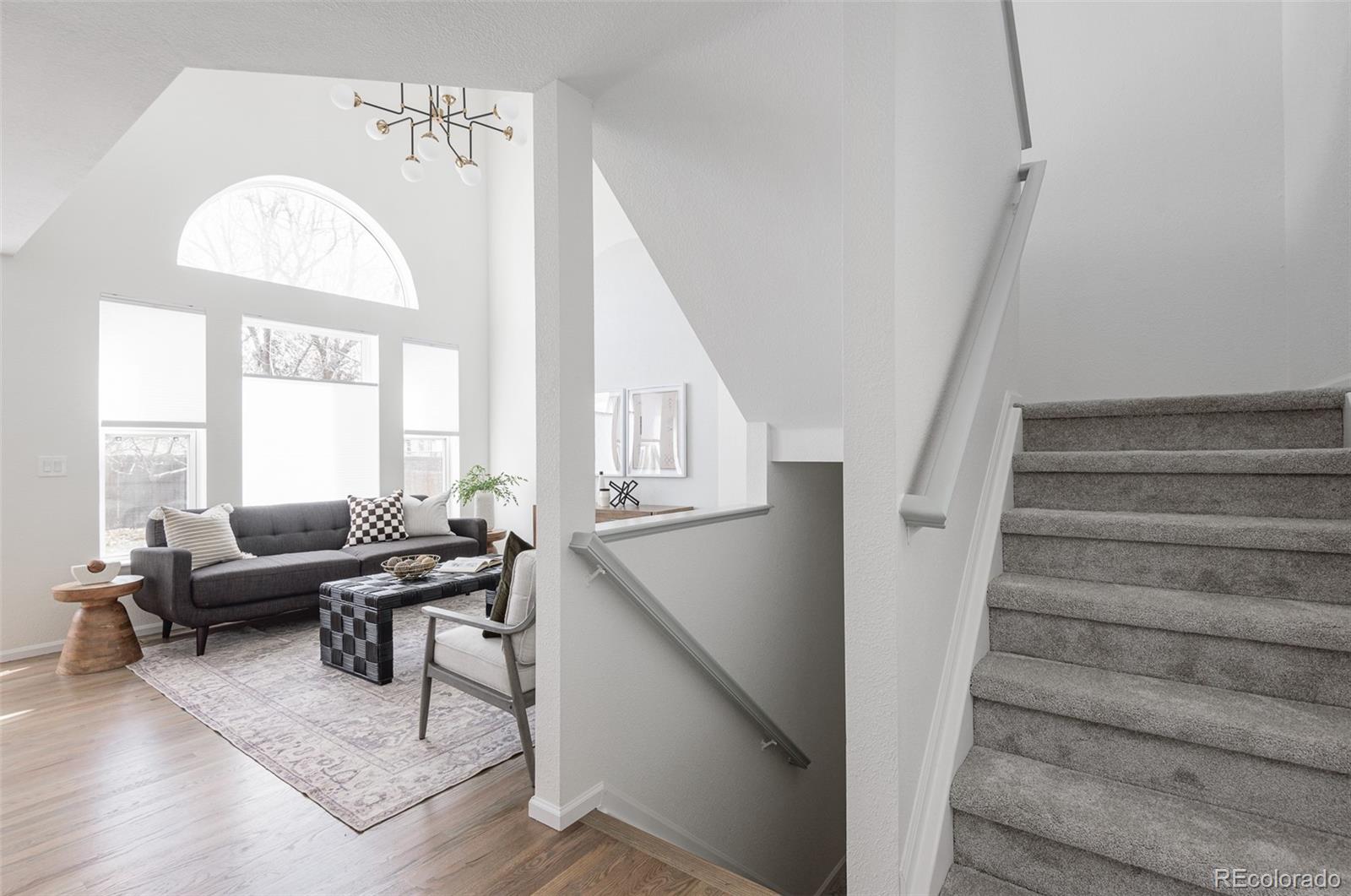 10754 West 107th Circle Westminster, CO 80021 - Photo 3 of 24 a living room with furniture and a window