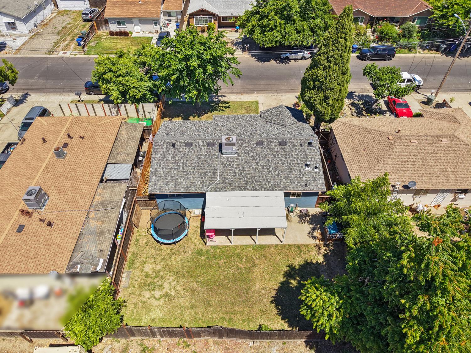 152 Drake Avenue Modesto, CA 95350 - Photo 38 of 52 an aerial view of a house with yard swimming pool and outdoor seating