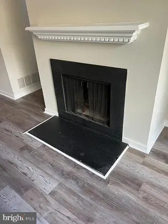 a living room with a fireplace
