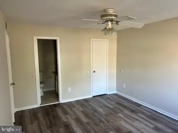 a view of a hallway with a chandelier