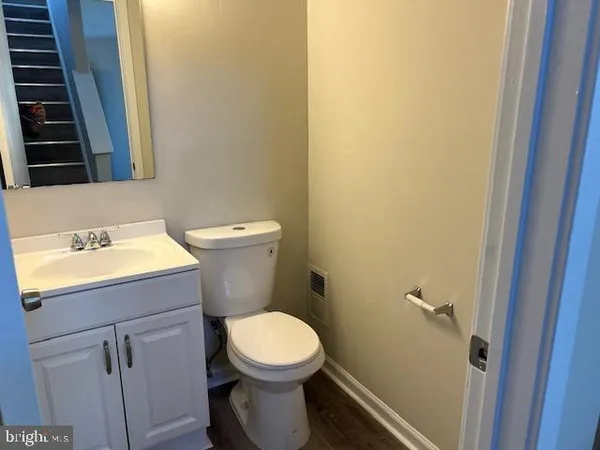 a bathroom with a sink and a toilet