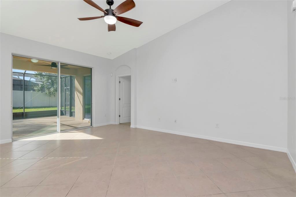 11229 Spring Point Circle Riverview, FL 33579 - Photo 11 of 40 a view of an empty room with a window