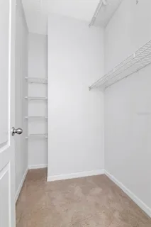 a view of an empty walk in closet