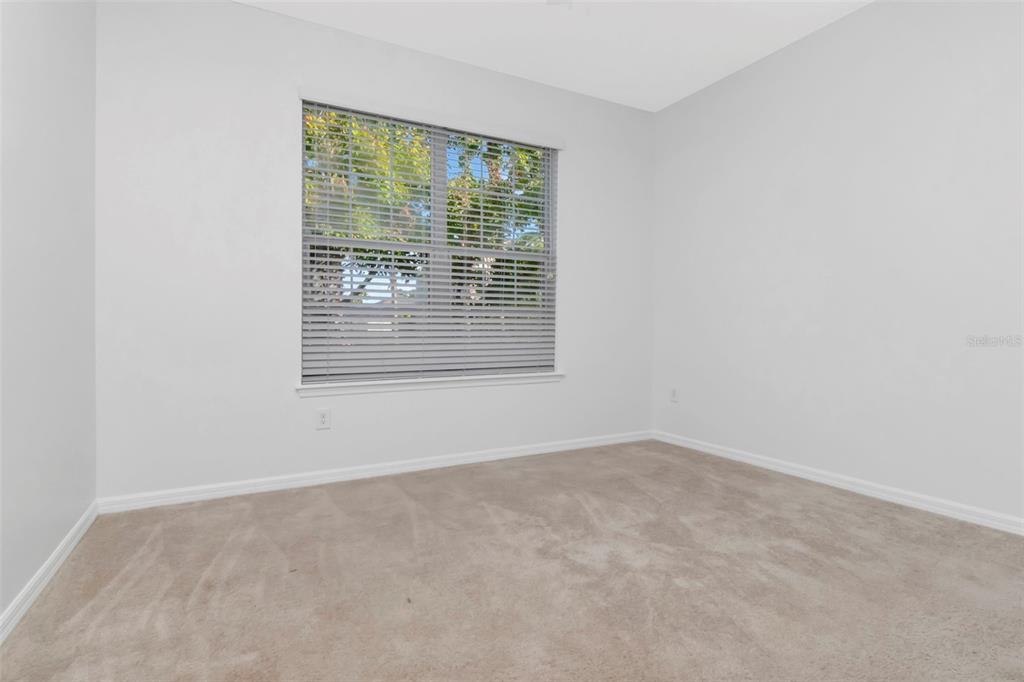 11229 Spring Point Circle Riverview, FL 33579 - Photo 20 of 40 an empty room with a window