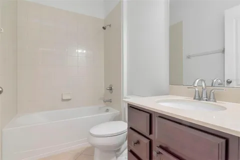 a bathroom with a sink and a toilet