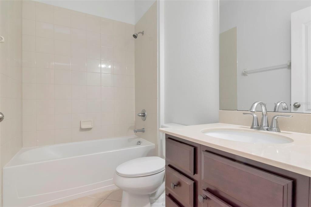 11229 Spring Point Circle Riverview, FL 33579 - Photo 21 of 40 a bathroom with a sink and a toilet