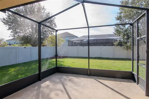 a view of a yard with an outdoor space
