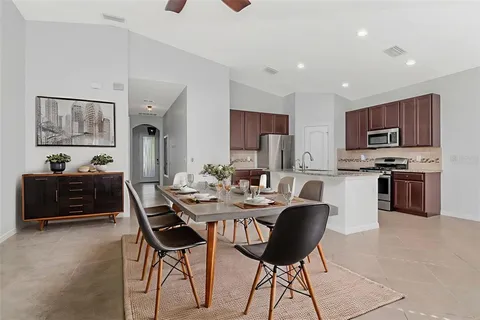 a view of a dining room with furniture